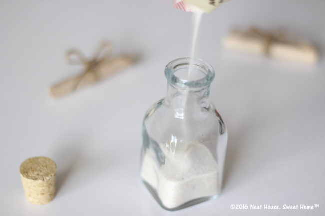 DIY Footprints in the Sand Baptism Favors | An excerpt of this beautiful prayer is tucked inside these miniature glass jars. This is a beautiful keepsake for Baptism, Dedication, and First Communion.
